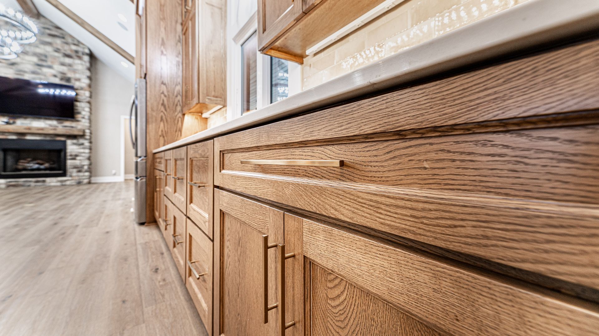 A kitchen with wooden cabinets and stainless steel appliances.
