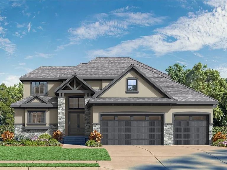 Two-story house with gray stone facade, three-car garage, and blue sky.