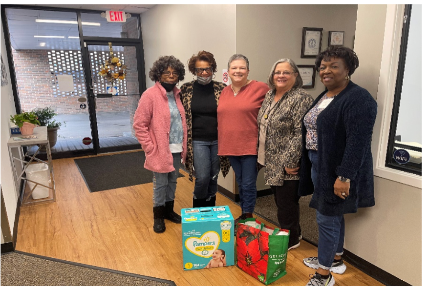 DOK members donating to DAYBREAK- “Mother’s in Crisis.”
