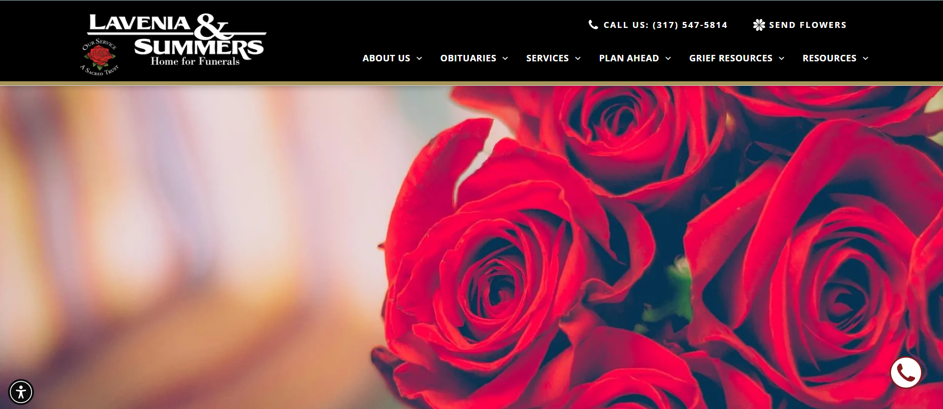 A bunch of red roses are on a website.