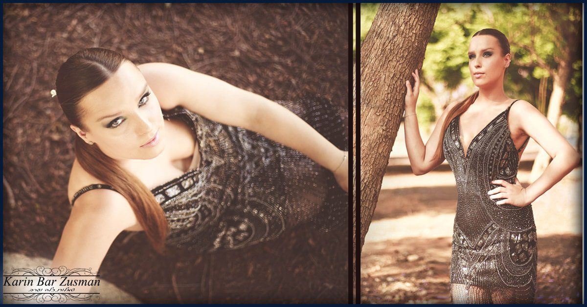 אישה בשמלה נוצצת מצטלמת ליד עץ ועל הקרקע.