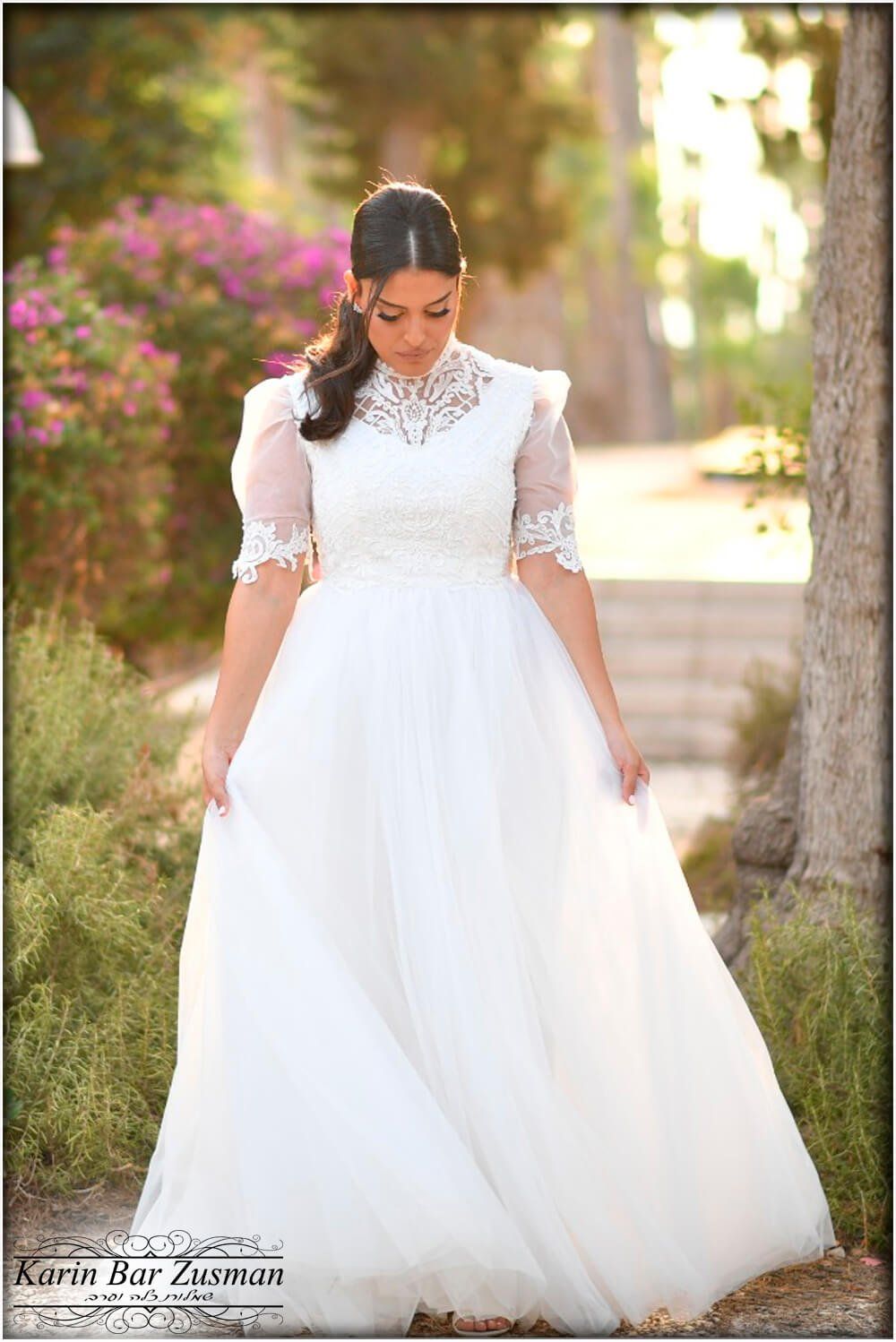 שמלת כלה עם שתי חצאיות ושרוולים נפוחים