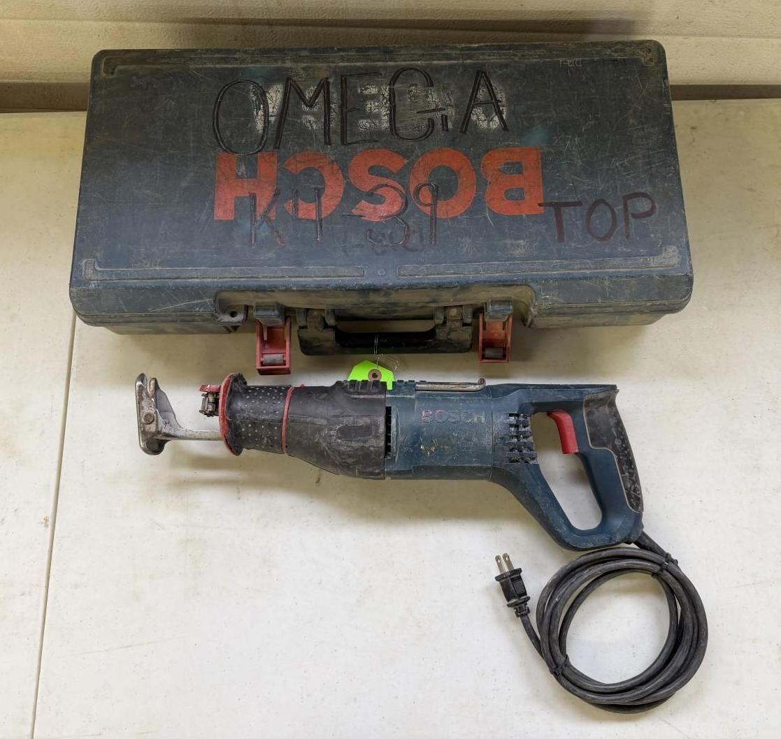 Bosch reciprocating saw and case on a surface. The case is black with red lettering. The saw is blue and black.