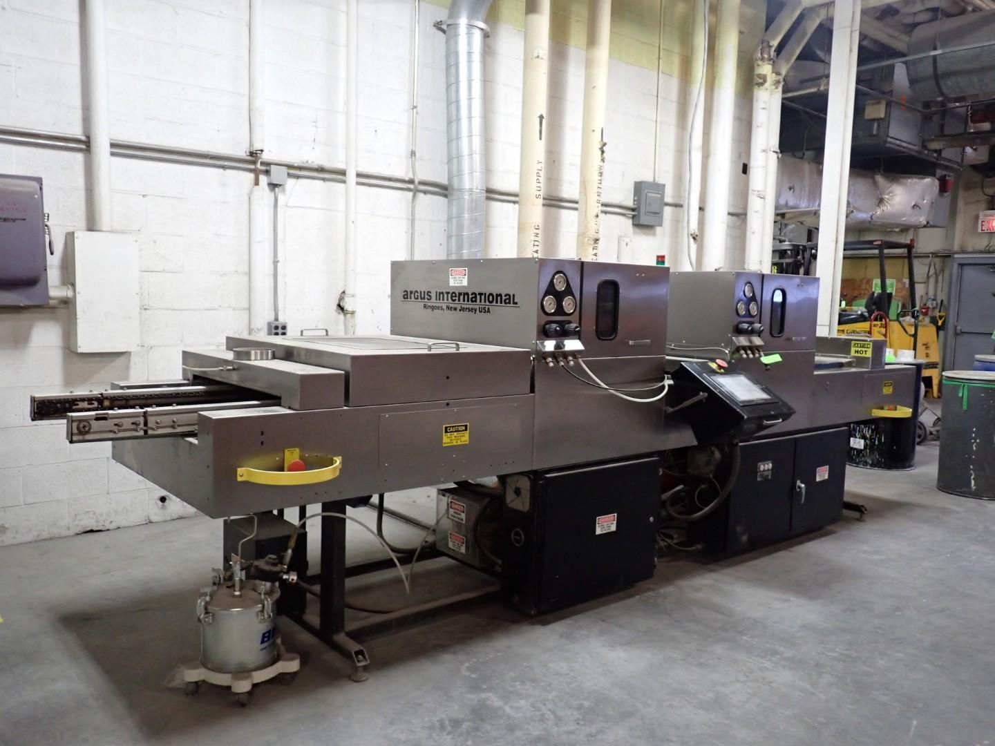 Large industrial machine in a warehouse setting.