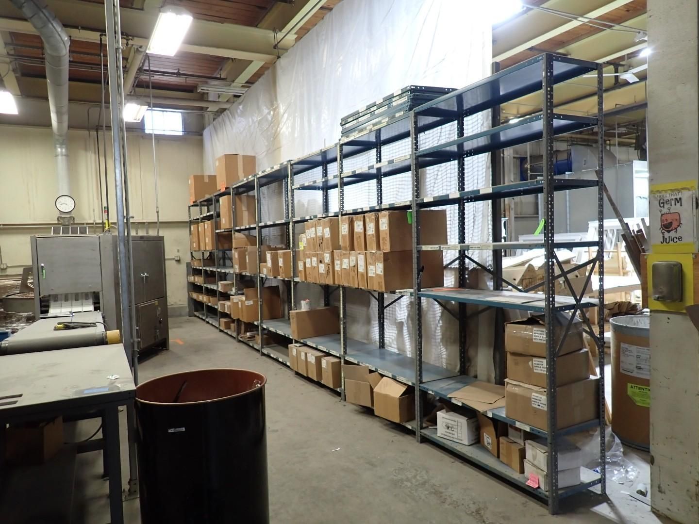 Warehouse shelving filled with boxes and items.