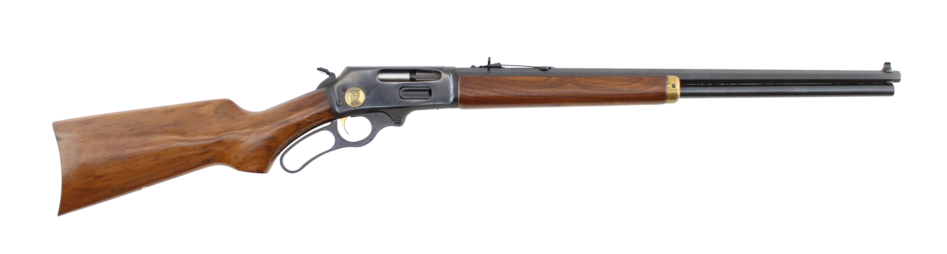 Antique lever-action rifle with wooden stock and long barrel on white background