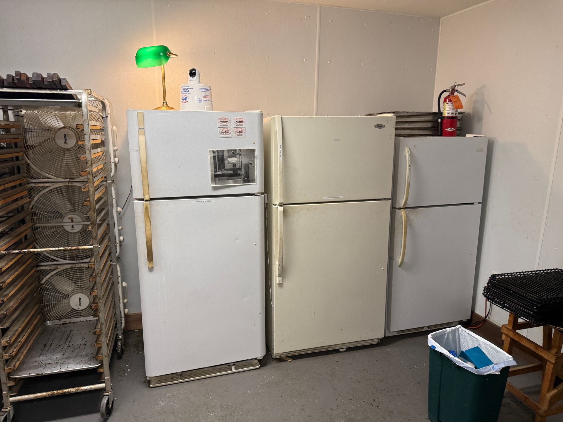 Three refrigerators lined up