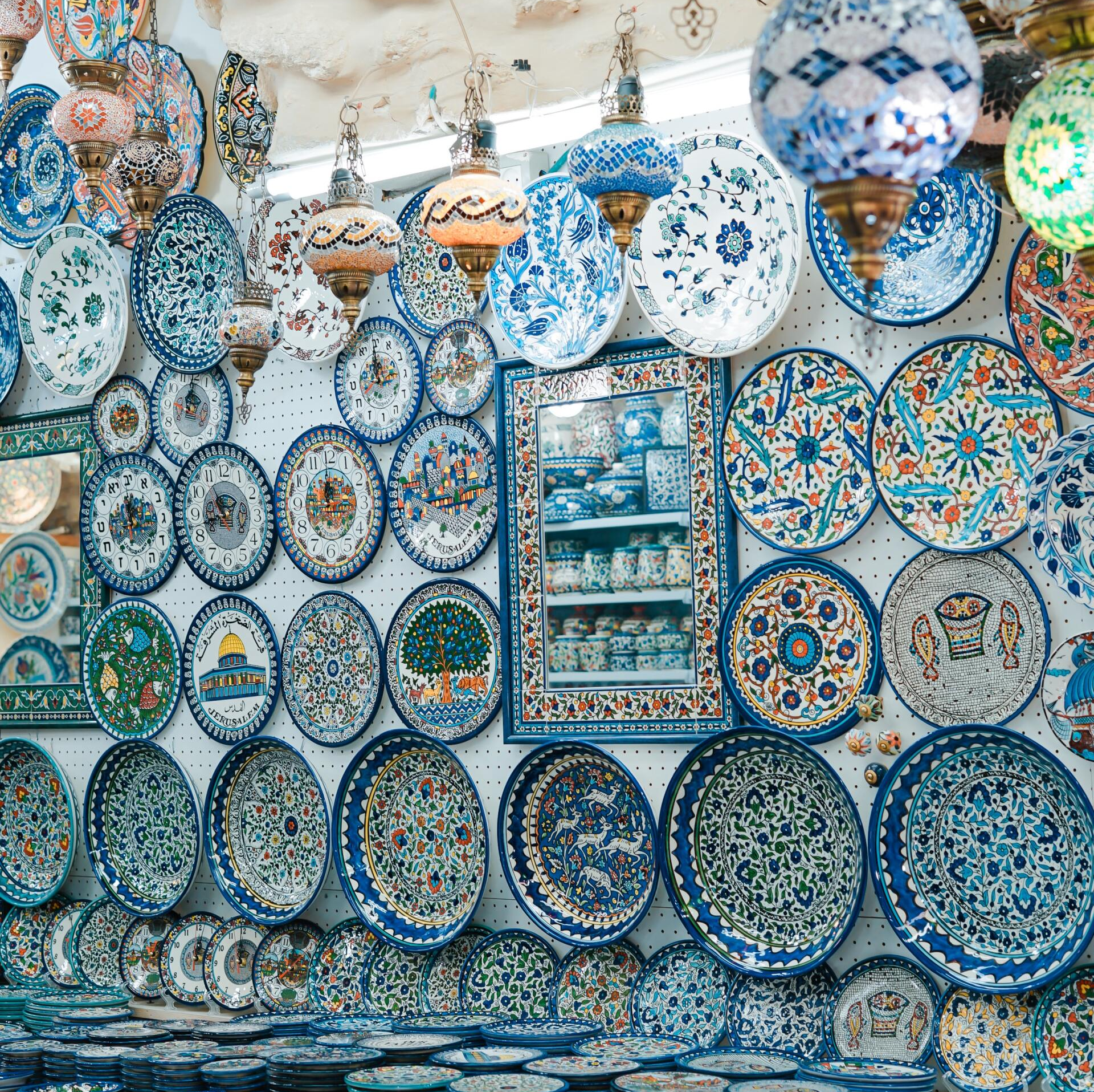 Folk Art: Plates and tapestries hanging on a wall