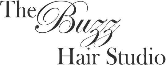 The logo for the buzz hair studio is black and white.
