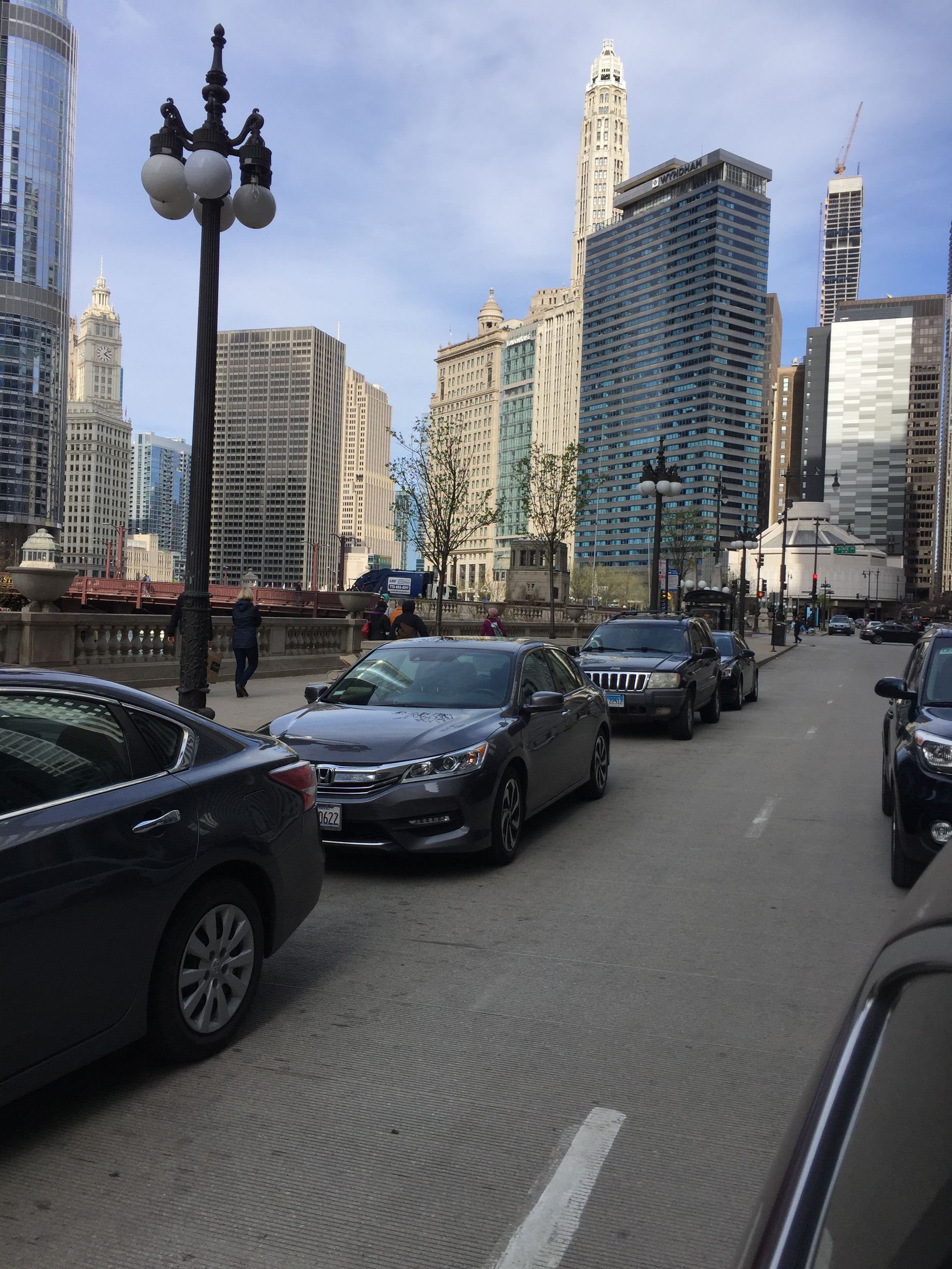A patio with a lot of furniture and lights at night.