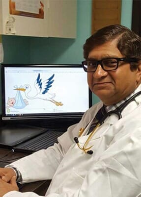 Dr. Mehta in the office - OBGYN Specialist in Warren, Ohio