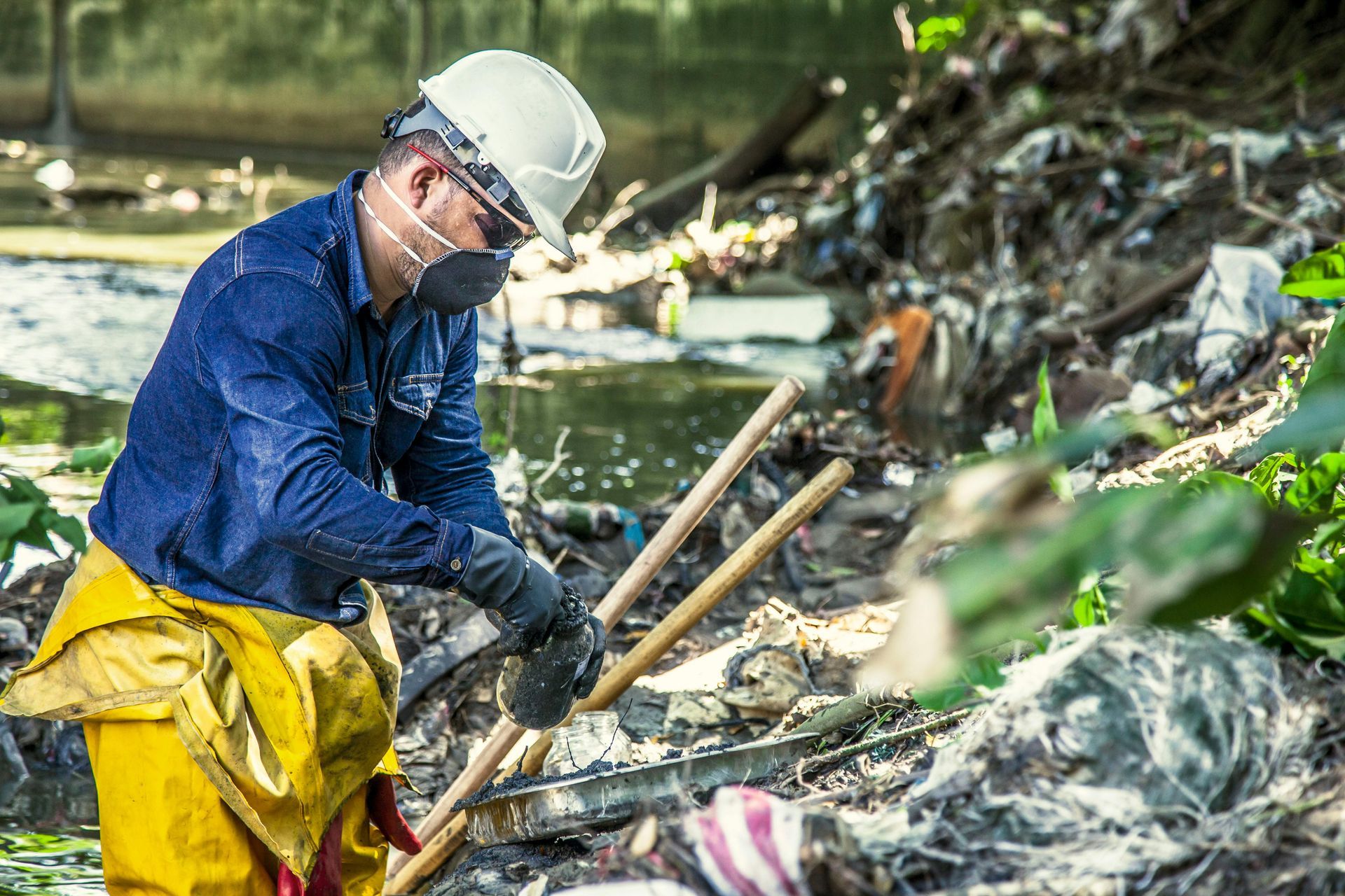 Man cleaning out outdoor debris