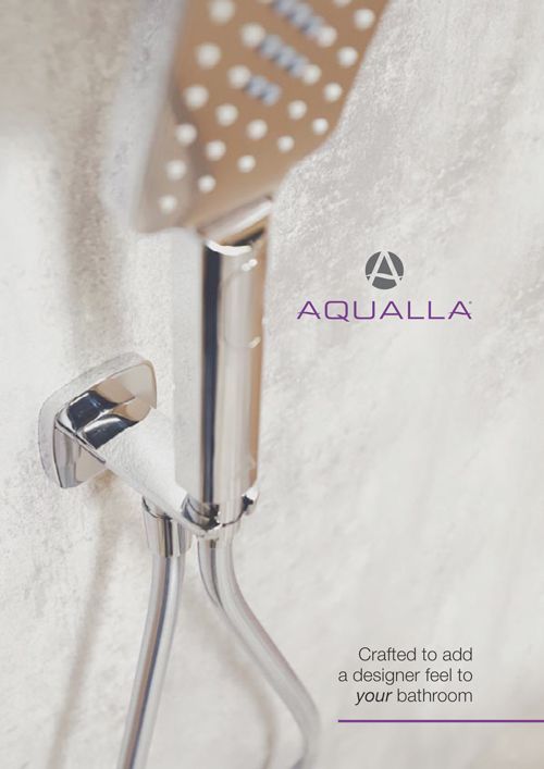 A close up of a shower head on a wall.