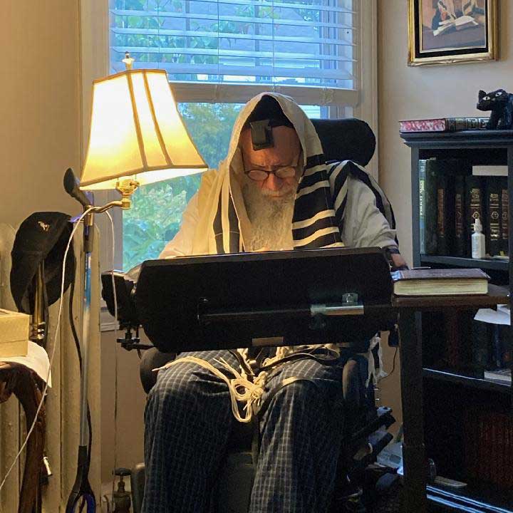 elderly man studying