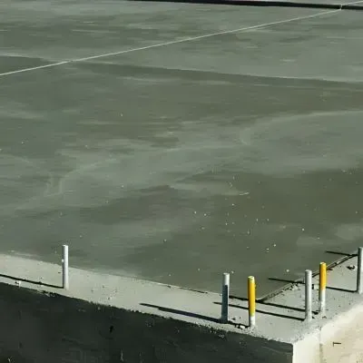 Commercial foundation project meeting standards for car parks, foundations, and footpaths.