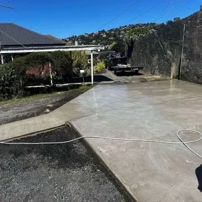 After: New backyard concrete slab with clean broom finish, Corstorphine