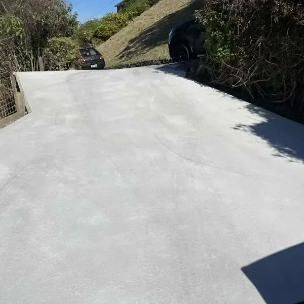 After: New 30sqm concrete driveway, end view shot, Pine Hill.