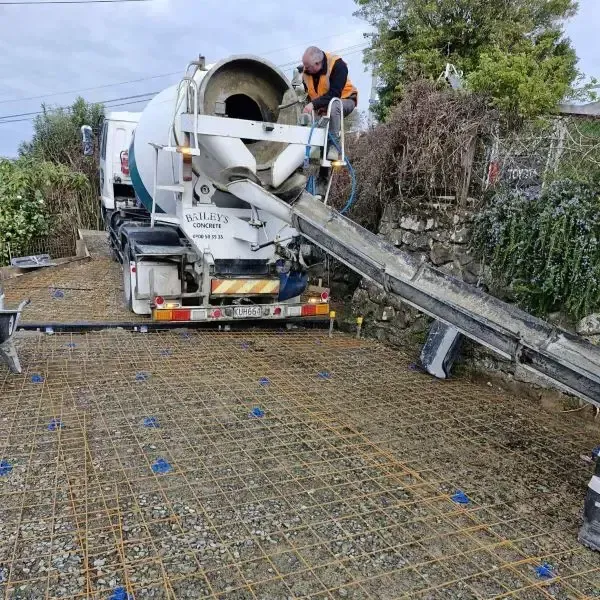 Before: Concrete truck preparing to pour concrete onto a reinforced 30sqm driveway, Pine Hill, Dunedin.