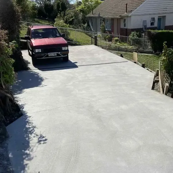 After: New 30sqm concrete driveway, showcasing a front view shot in Pine Hill.