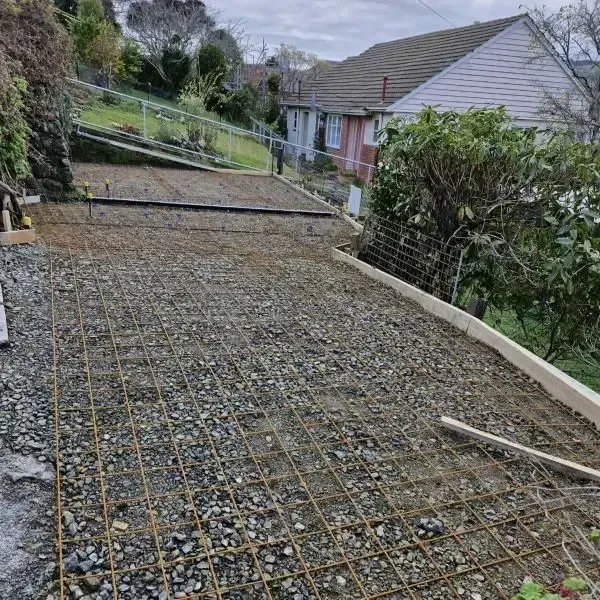 Before: Front view of a reinforced 30sqm driveway with boxing and mesh before the pour, Pine Hill, Dunedin.
