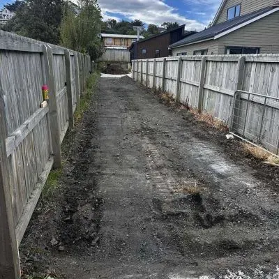 Before: Gravel driveway prior to concrete pour, 50m x 3m, Brighton, Dunedin