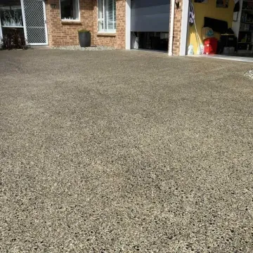 After: Sealed exposed aggregate concrete driveway for added protection and aesthetic, Caversham.