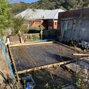 Before: Concrete shed slab, mesh and reinforcement with boxing, 10 metre square, Ravensbourne, Dunedin.