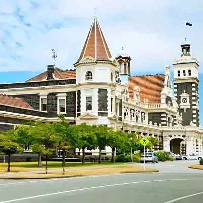 Dunedin Railway Station highlighting local expertise and service areas served by Dunners Concrete.