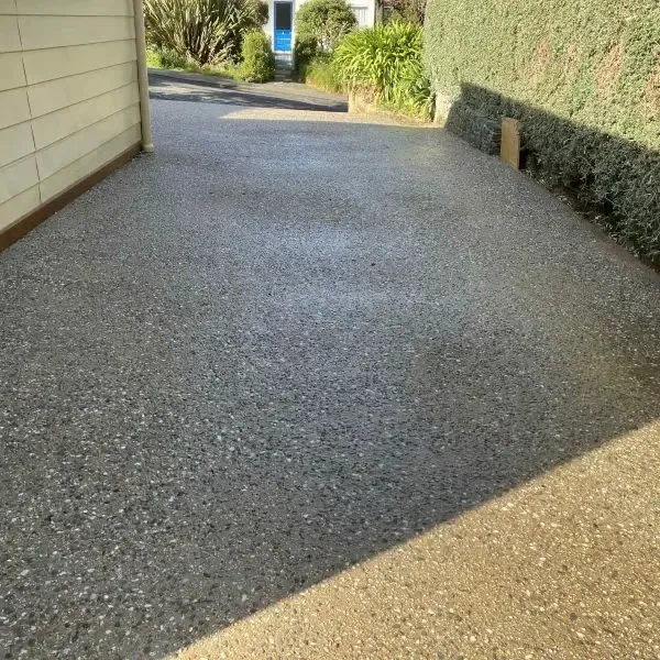 After: New 15msq exposed aggregate concrete carport, Macandrew Bay.