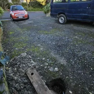 Before: End view of an existing old gravel 50msq driveway, Macandrew Bay, Dunedin.