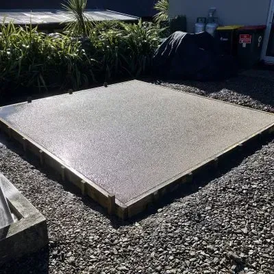 Exposed Aggregate Concrete Slab For A Spa Pool Foundation In Kinmont Park, Dunedin.