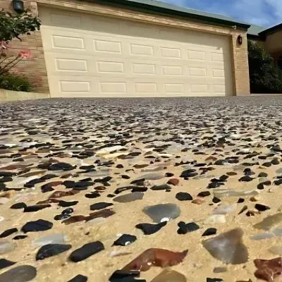 Durable and attractive exposed aggregate concrete driveway in Forbury.