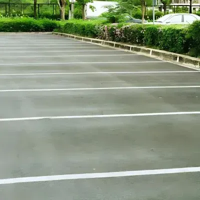 Heavy-duty concrete car park surface with line marking for businesses.