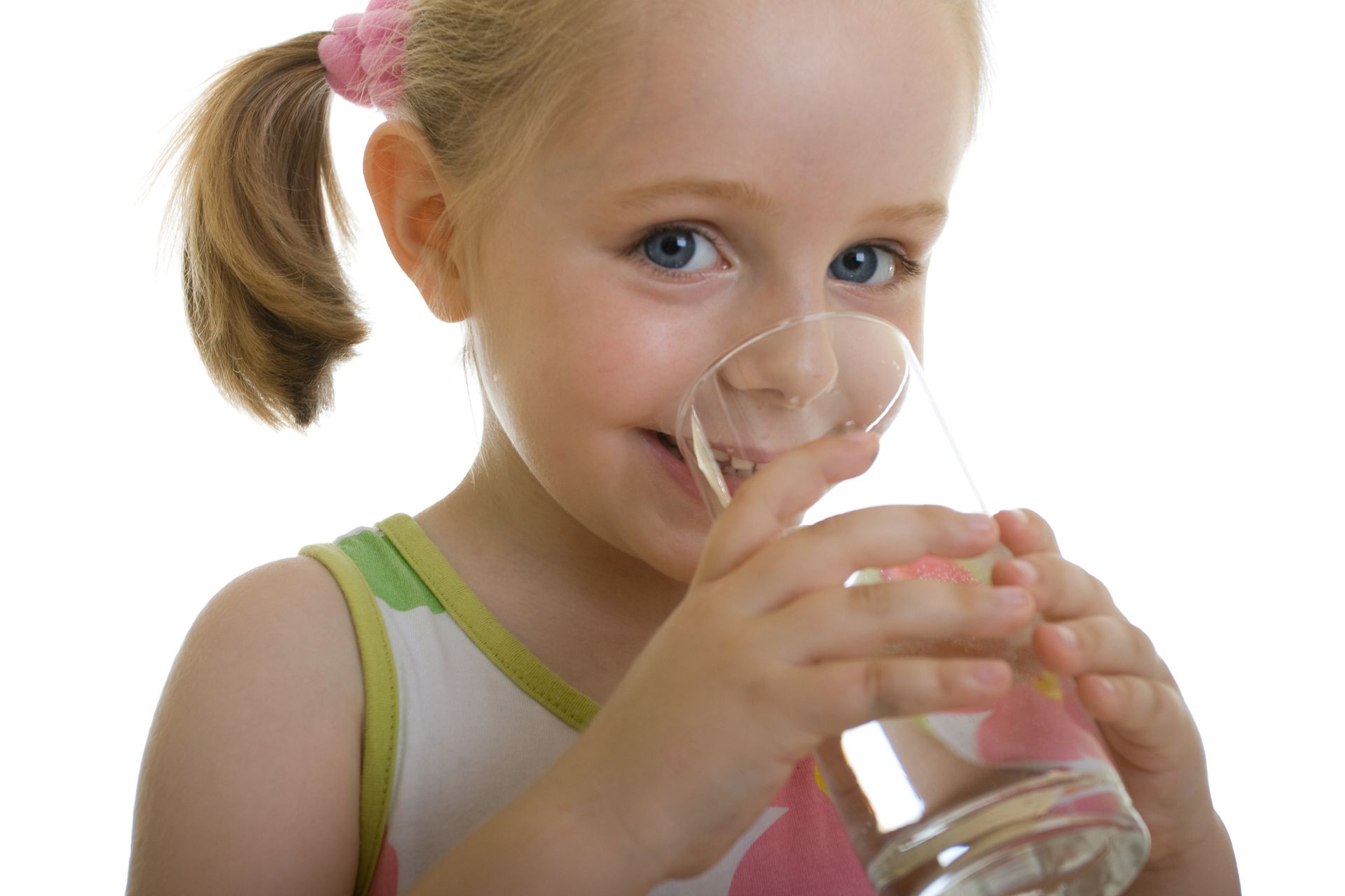 A Person Is Pouring Water Into A Glass From A Faucet — McAllen, TX — Clear Choice H2O