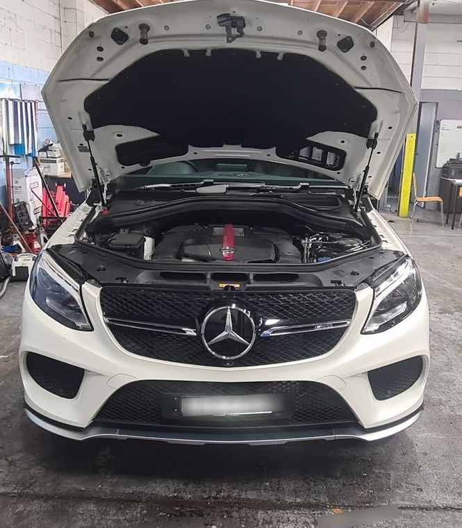 repairing the chassis and engine in a vehicle repair shop