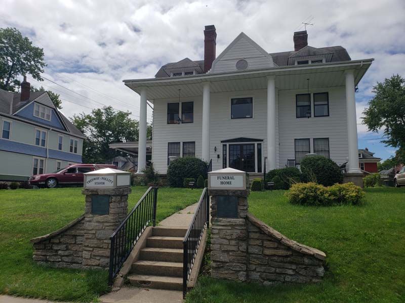 Several photos of exterior and interior of Tredway Funeral Home in Norwood, OH
