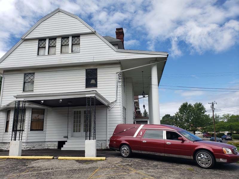 Several photos of exterior and interior of Tredway Funeral Home in Norwood, OH