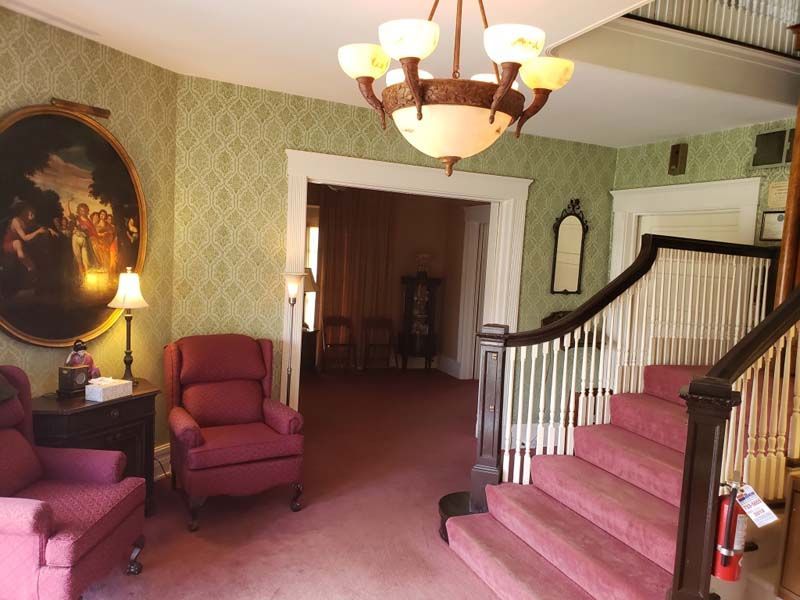 Several photos of exterior and interior of Tredway Funeral Home in Norwood, OH