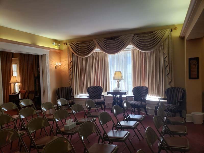 Several photos of exterior and interior of Tredway Funeral Home in Norwood, OH