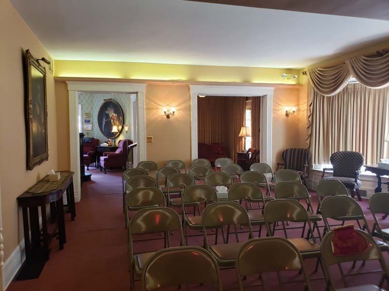 Several photos of exterior and interior of Tredway Funeral Home in Norwood, OH