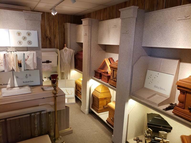 Several photos of exterior and interior of Tredway Funeral Home in Norwood, OH