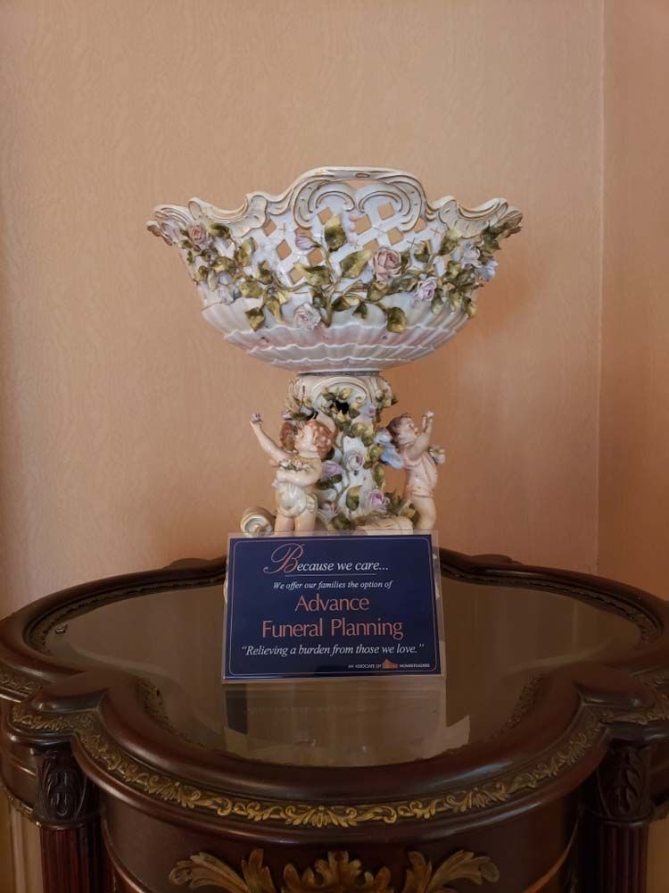 Several photos of exterior and interior of Tredway Funeral Home in Norwood, OH