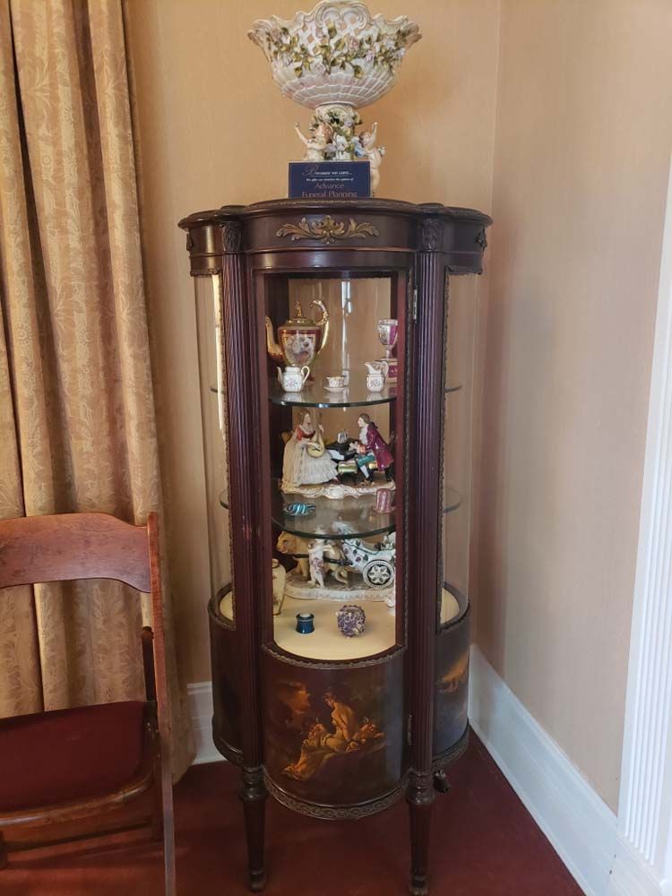 Several photos of exterior and interior of Tredway Funeral Home in Norwood, OH