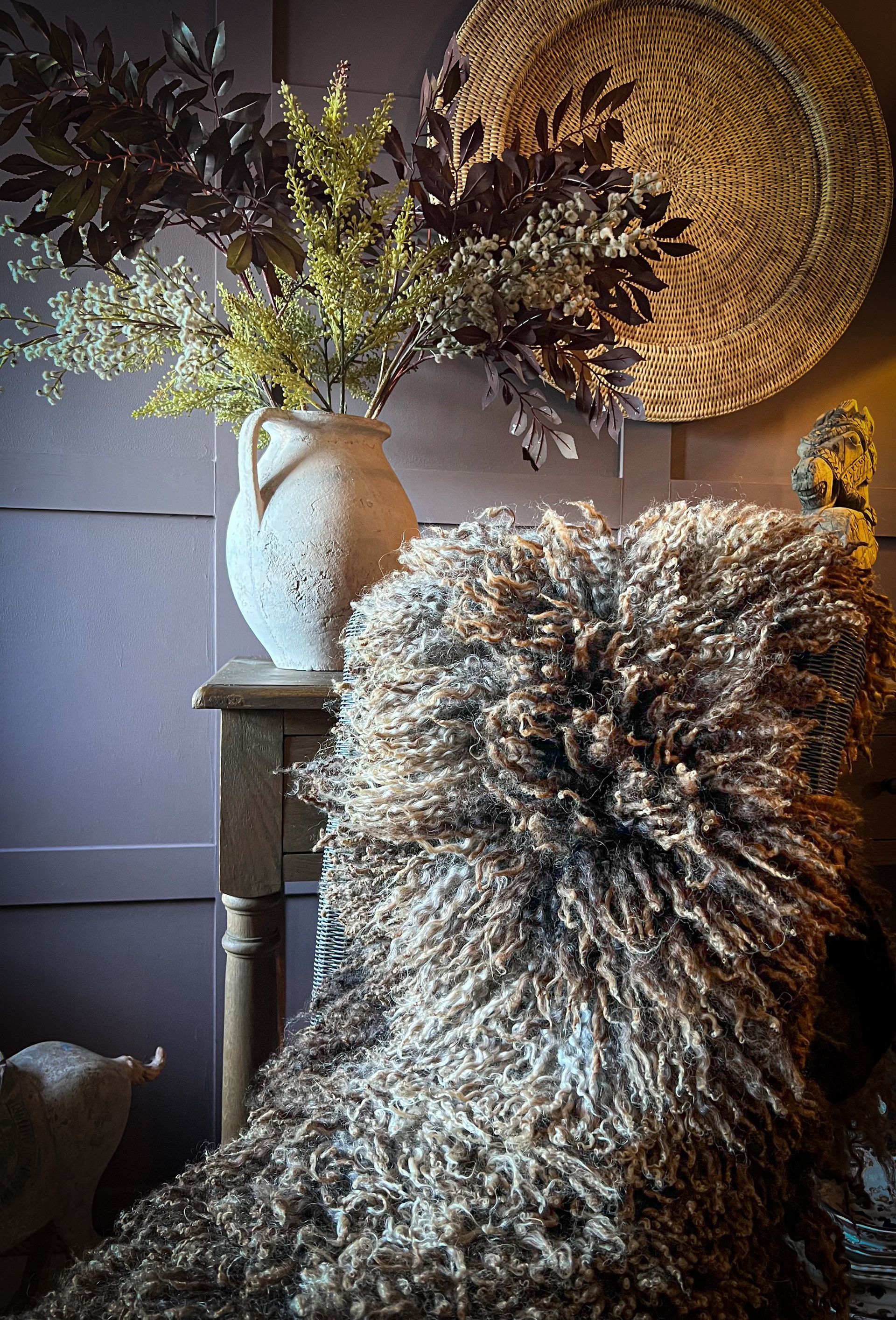 Long wool felted fleece rug handcrafted by felt artist Karolina Begier, showcasing natural texture and organic form.