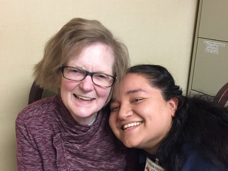 Elderly Resident Beside Her Caregiver