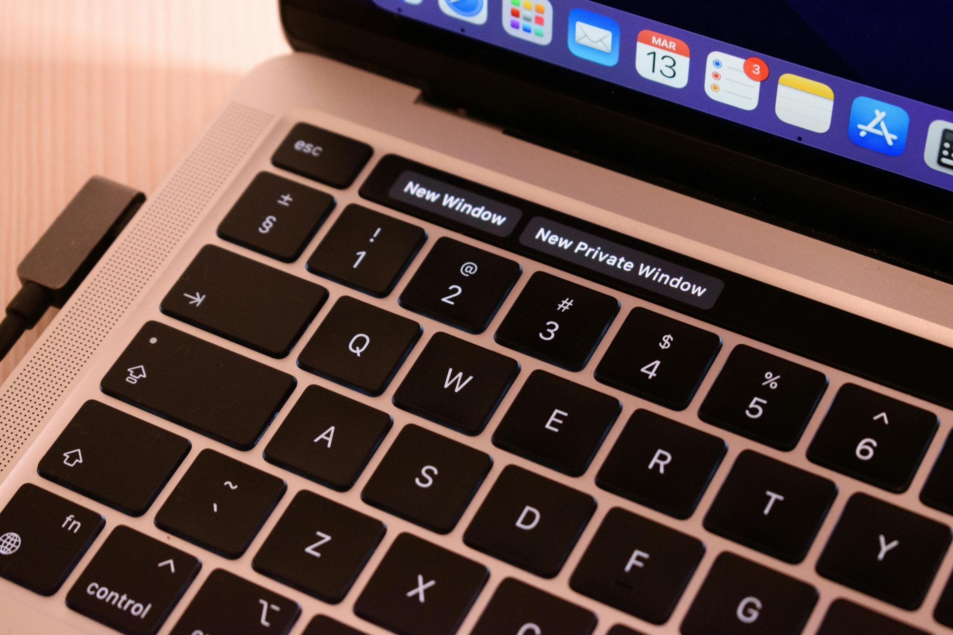 Close-up of a laptop keyboard with highlighted 