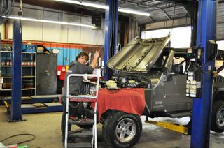 Mechanics — Two Mechanics Repairing Car in Knightdale, NC