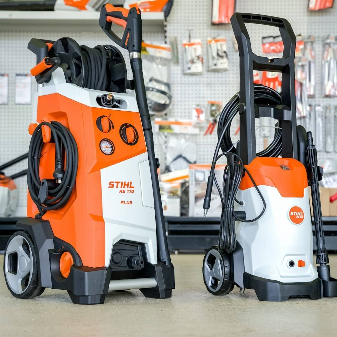 Two Stihl Pressure Washers Are Sitting Next To Each Other In A Store — Coastal Farm & Motorcycles In Innisfail, QLD