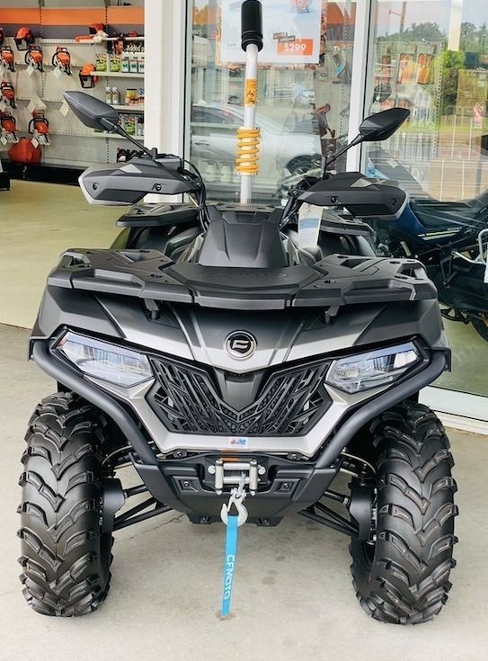 A Gray ATV Is Parked In Front Of A Store — Coastal Farm & Motorcycles In Innisfail, QLD