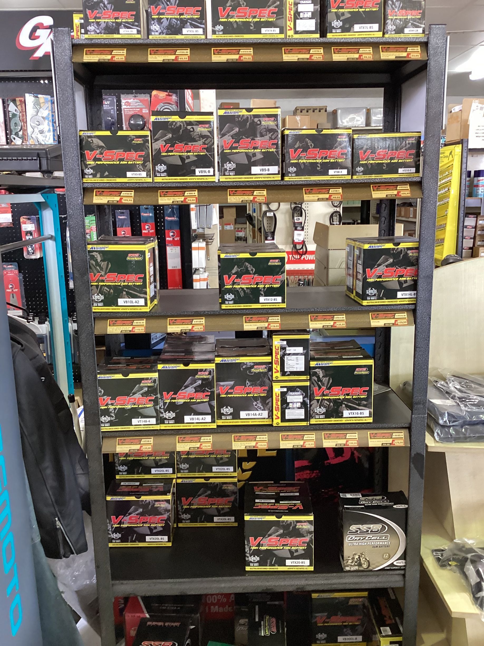 Shelves Of Motorcycle Batteries — Coastal Farm & Motorcycles In Innisfail, QLD